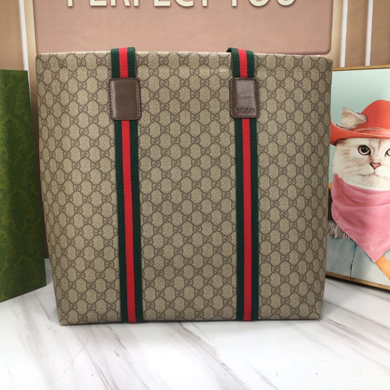 G*u*i shopping bags